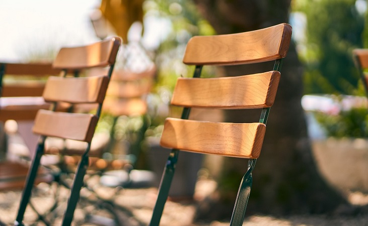 Wooden chair backs in a beer garden