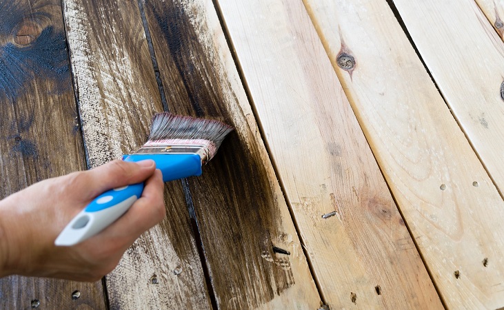 Adding a coat of paint to outdoor furniture